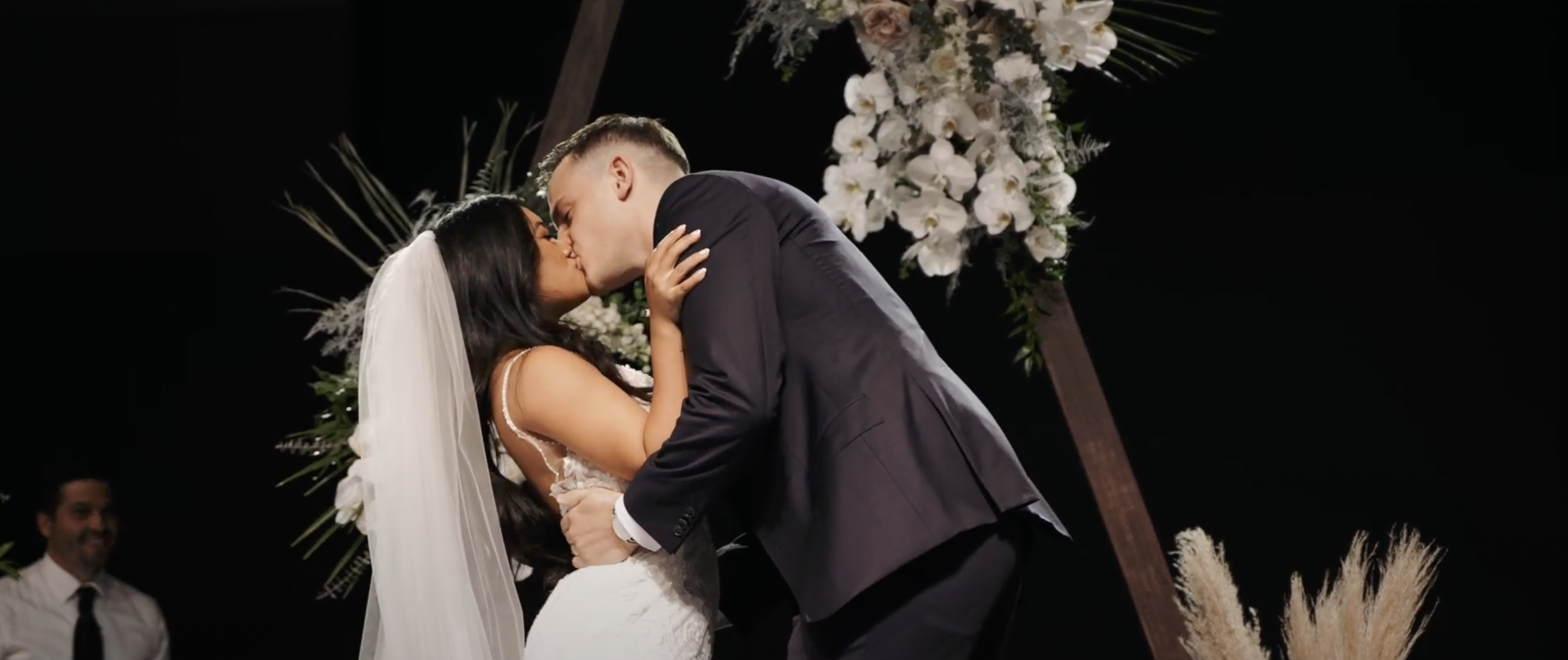 bride and groom first kiss, hope city church in edmonton