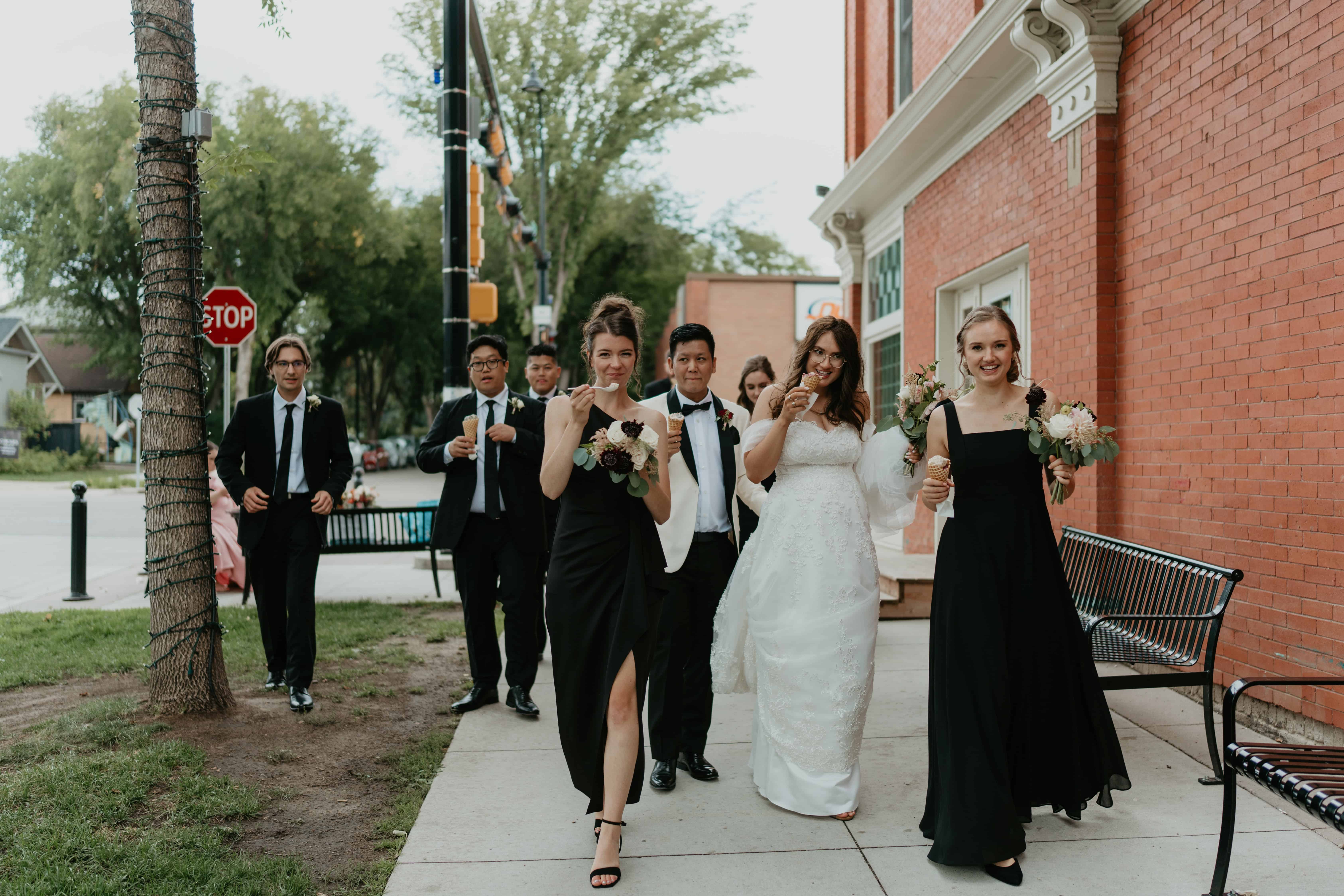 candid wedding party walking