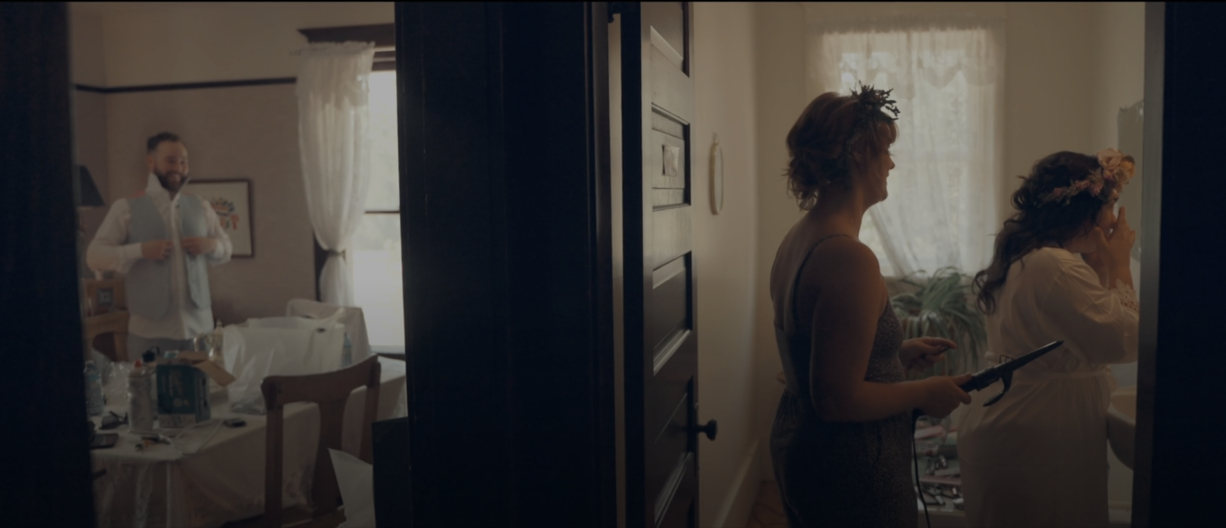 groom and bride visible getting ready in different rooms